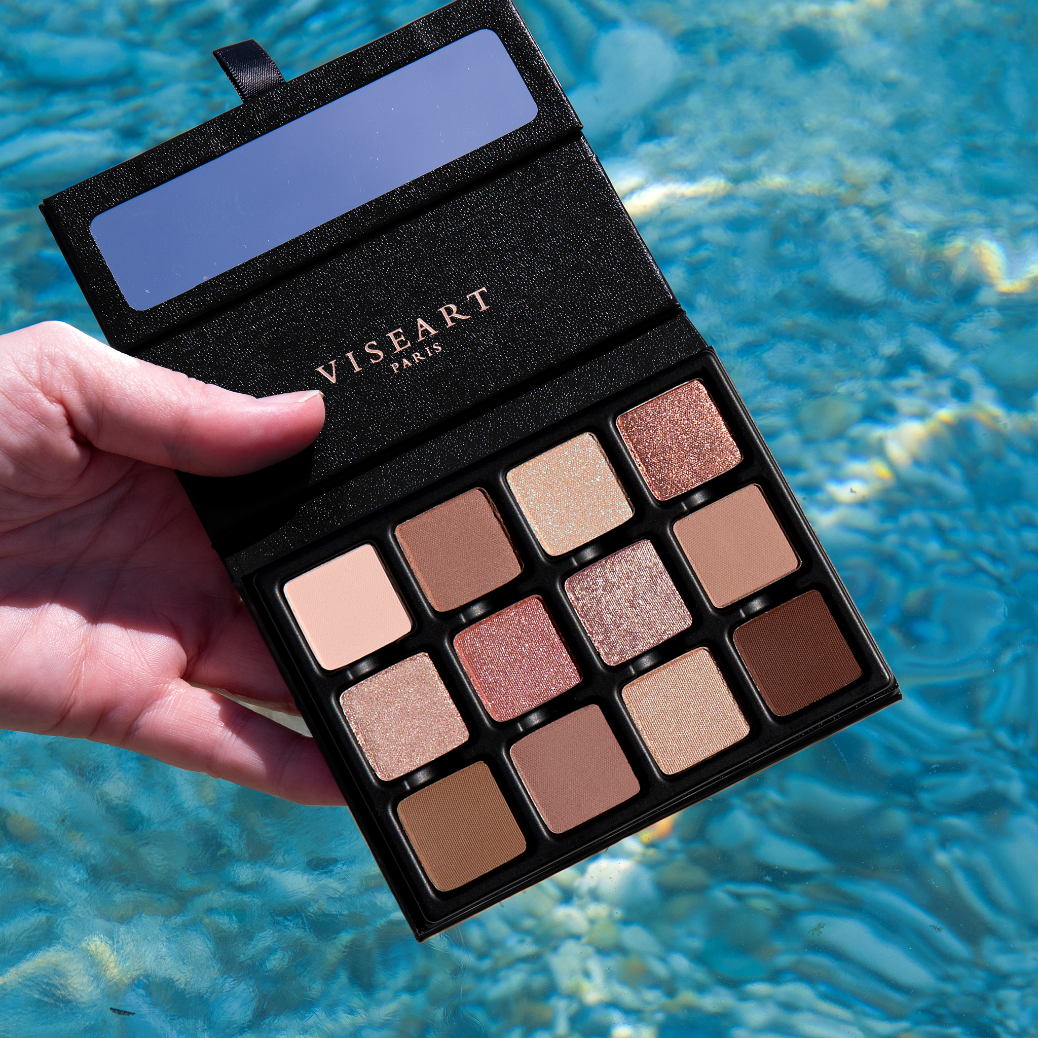 Close-up of Bon Bon Praline Étendu palette with Riveria-inspired shades in mattes, satins, and duochromes