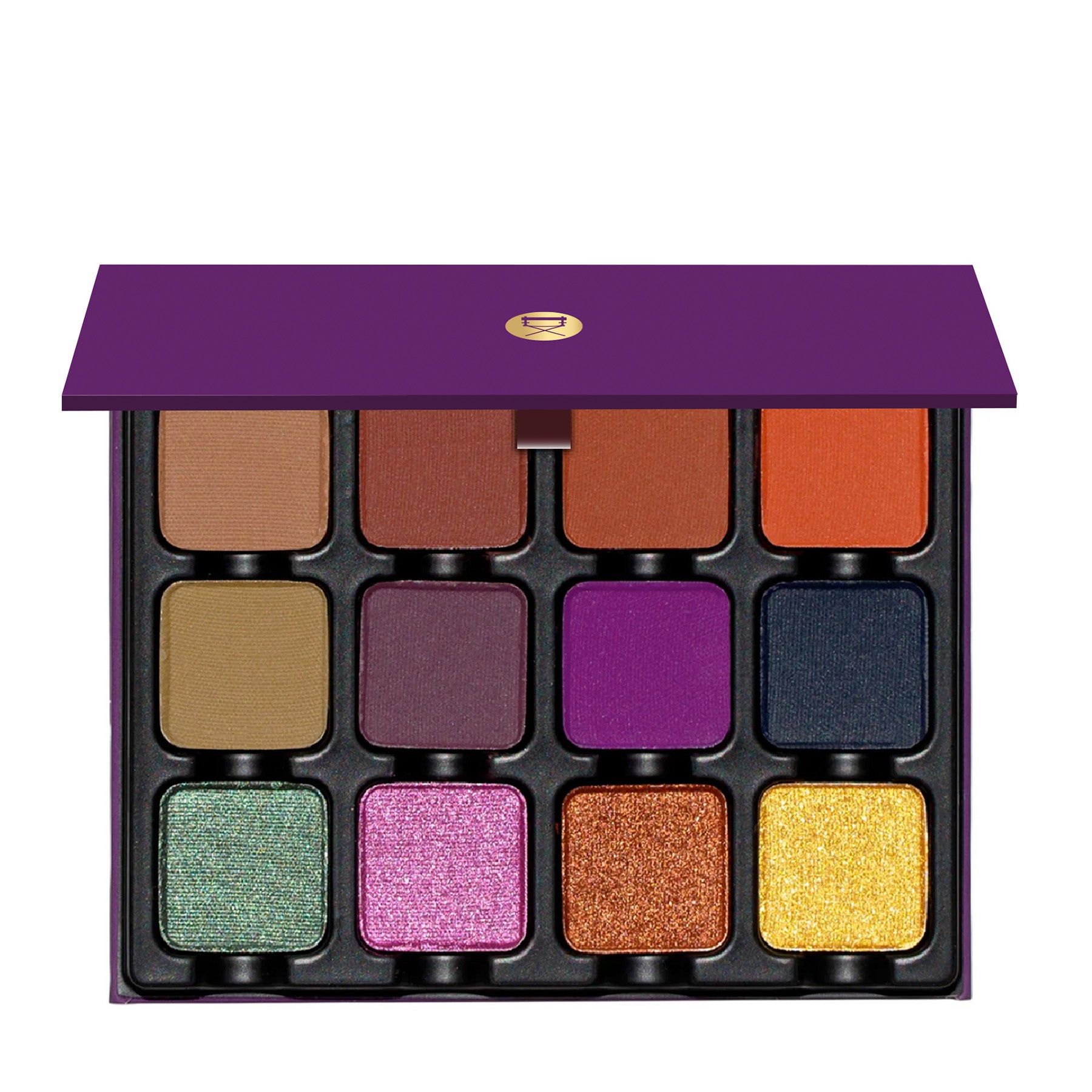 Open Dark Edit eyeshadow palette showing emerald, copper, plum, and gold shades in matte and shimmer finishes.