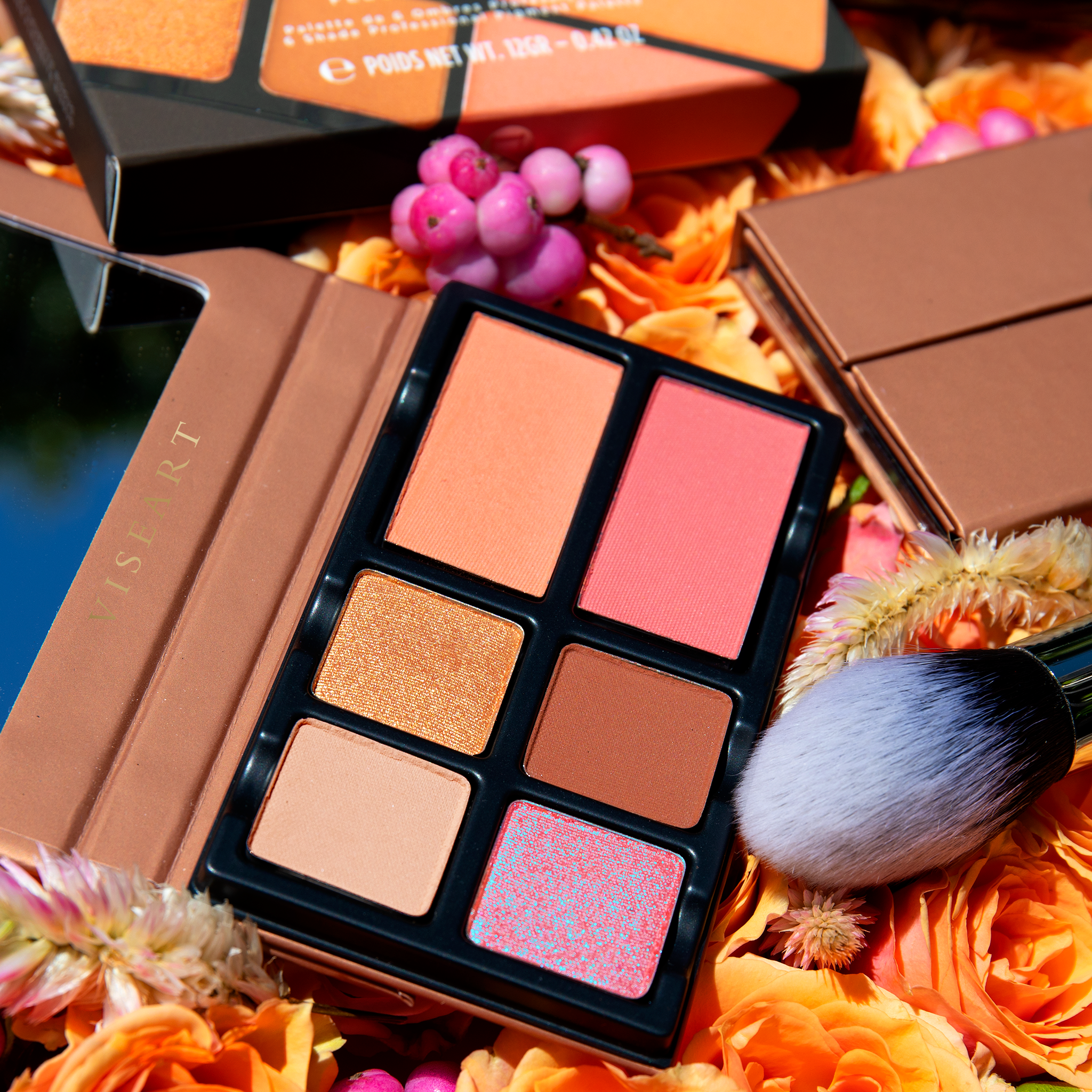 Fleurette Bisous open palette with rose pink, petal peach, and coral tones in matte and satin shimmer finishes for cheeks and eyes.
