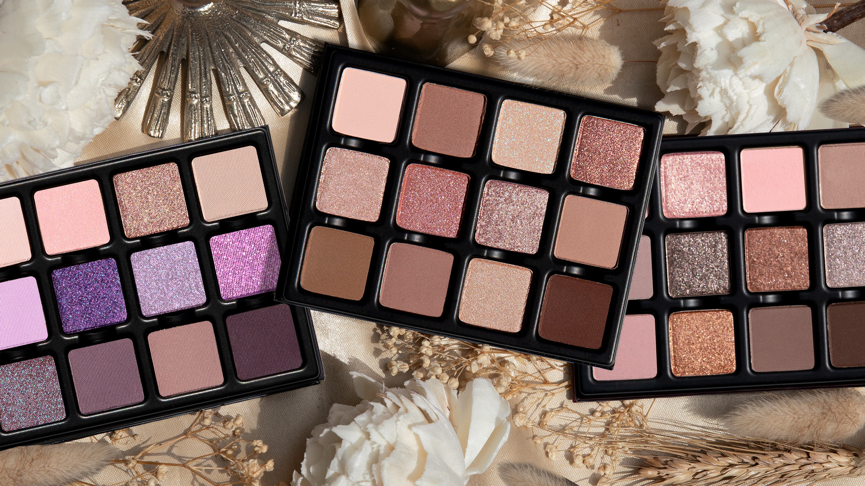 Viseart eyeshadow palette assortment flat lay featuring colorful matte, shimmer, metallic, and duochrome shades