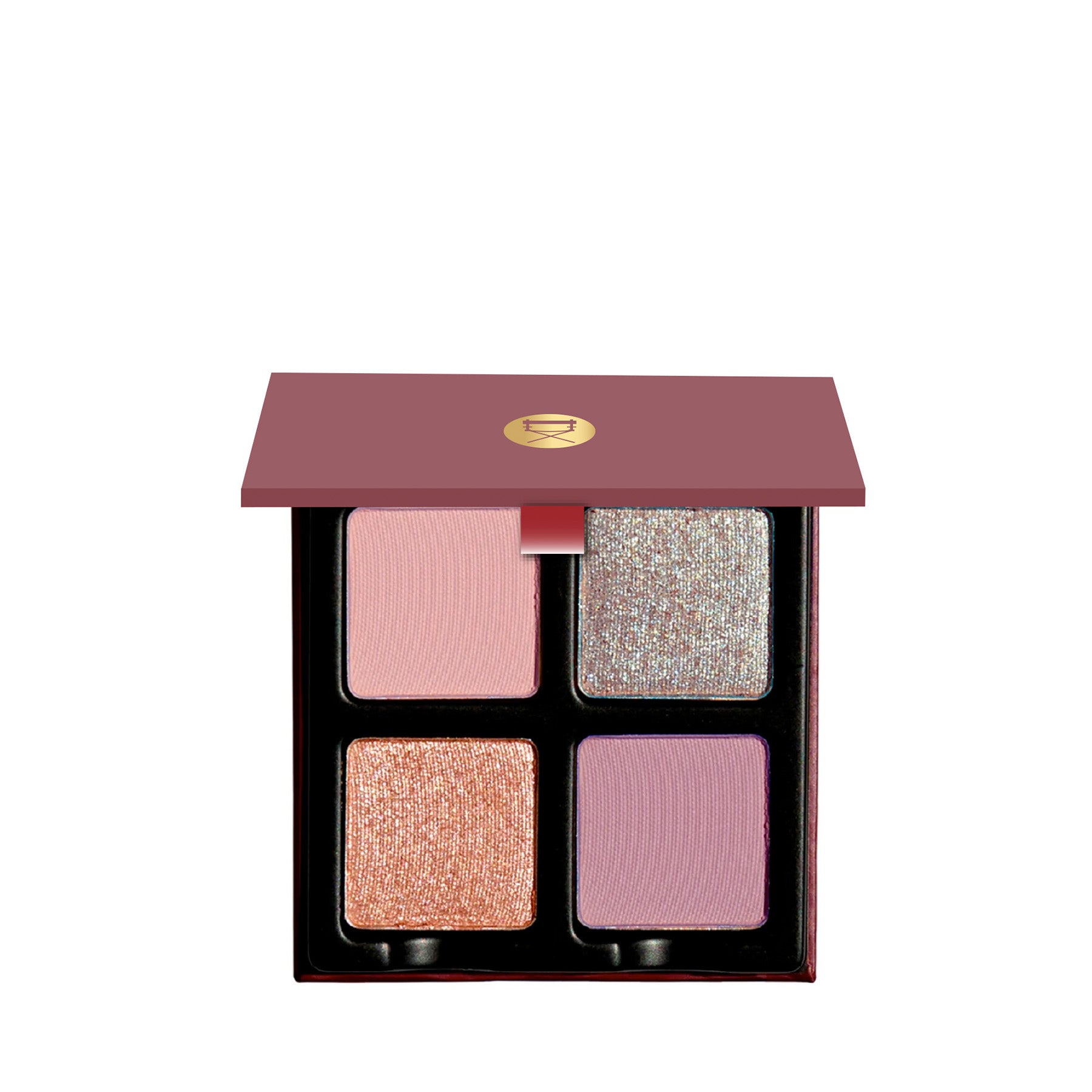 Open Petits Fours Lilas palette with soft lilac, mauve, and pink-toned eyeshadows in shimmer and matte finishes.
