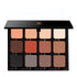 Makeup palette with various shades of eyeshadows in a black Vissagi branded case.