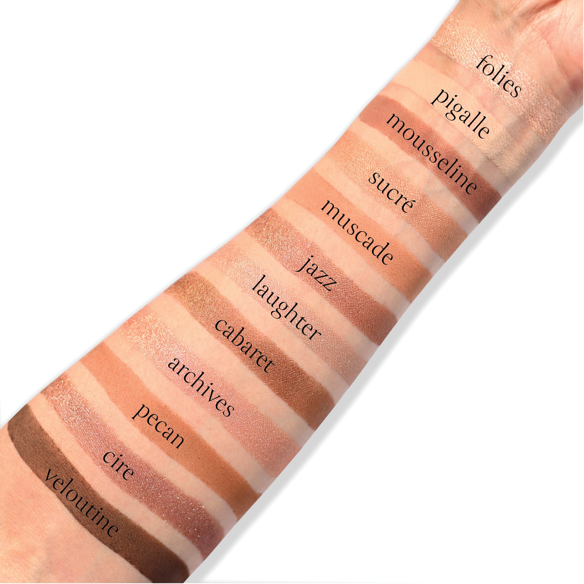 Swatches of Praline Étendu eyeshadow palette with spring tones of copper, clay, caramel, cocoa, golden almond shimmer