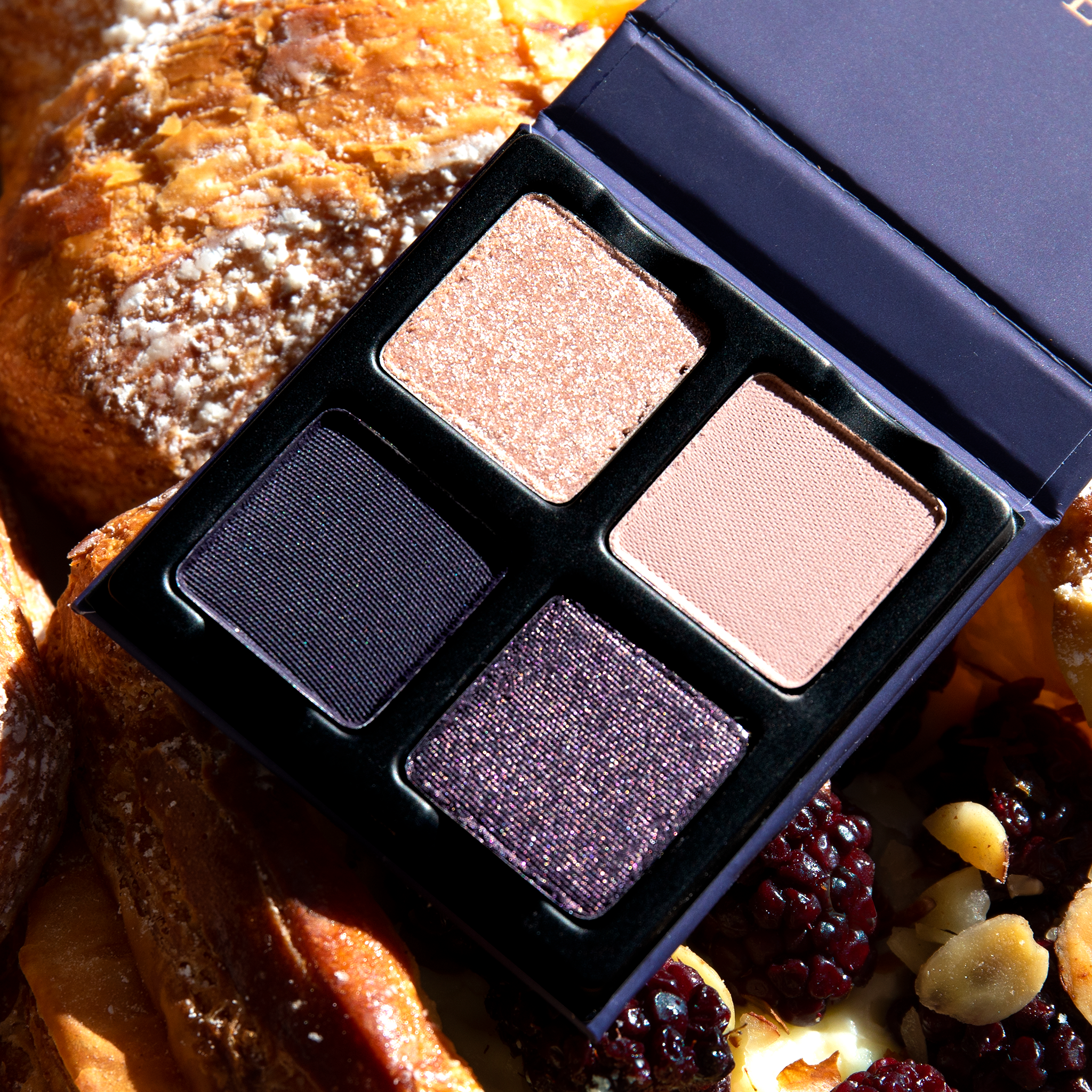 Open Petits Fours Tyrian palette with deep plum matte, fig shimmer, and antique burgundy tones.