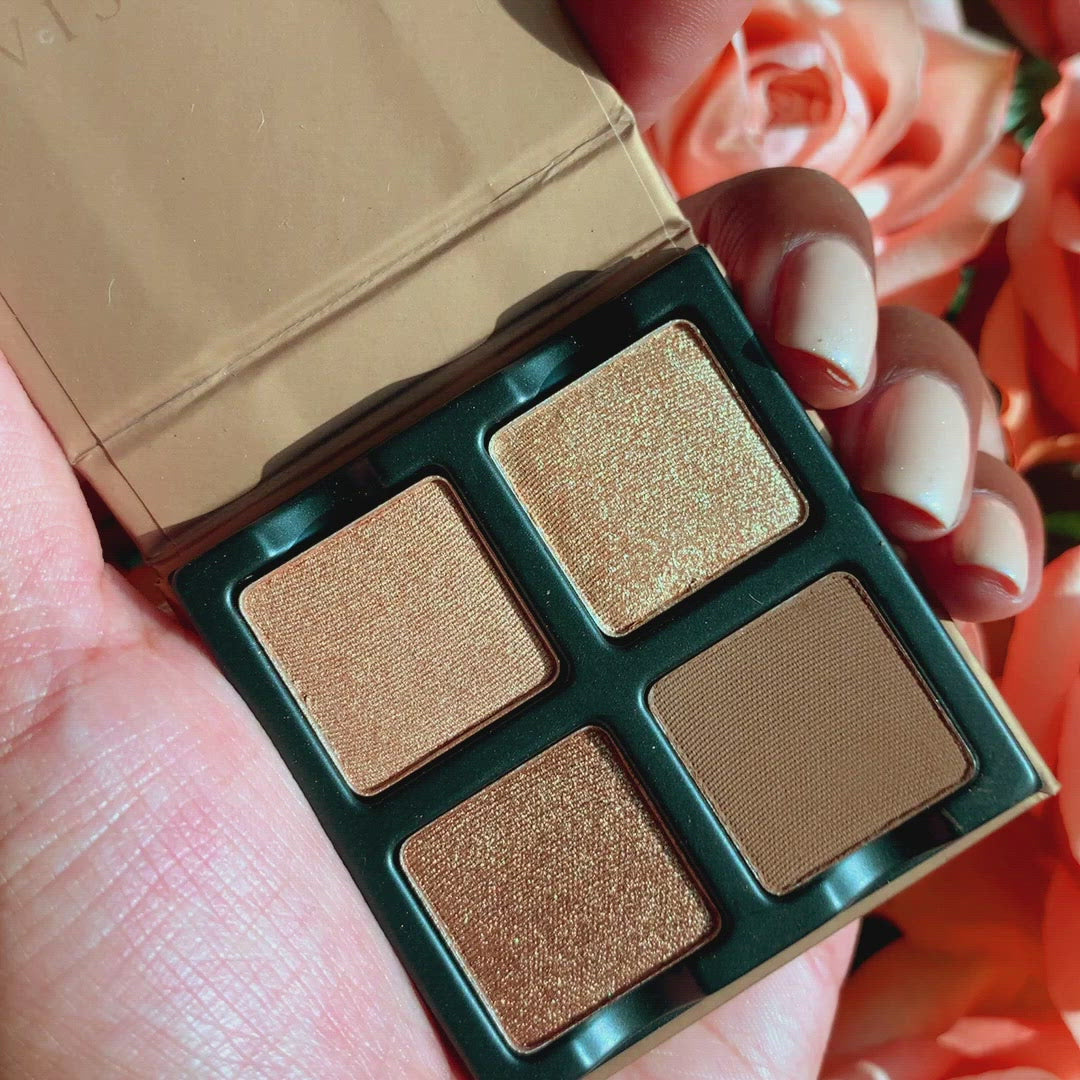 Closeup video of a Open Petits Fours Praline palette with golden champagne shimmer, taupe matte, and neutral brown tone.