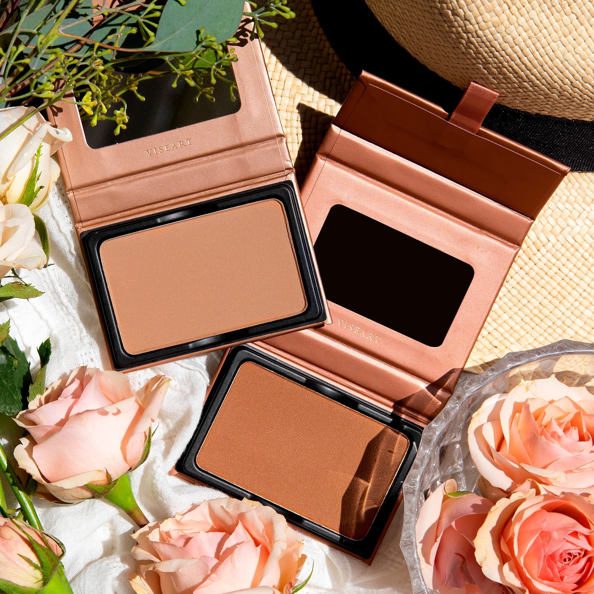 Viseart Bronze Noix and Noisette shown side by side, highlighting warm sculpting tones for a range of skin depths.