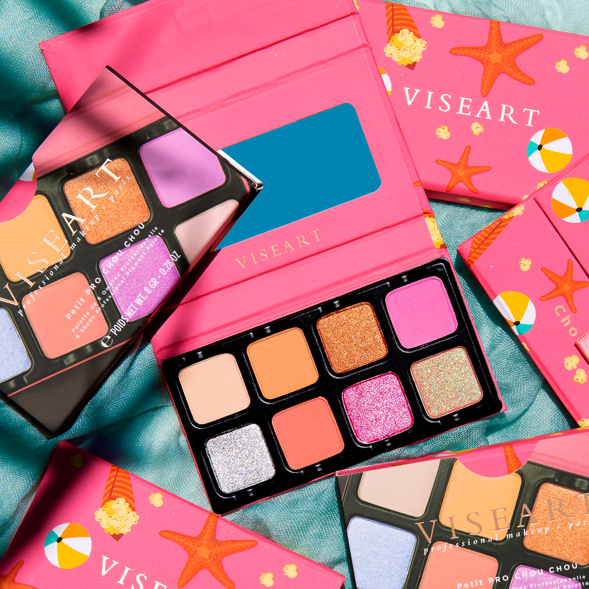 Open Petit Pro Chou Chou palette showing pastel pink, peach, lilac, and lemon shimmer eyeshadows.