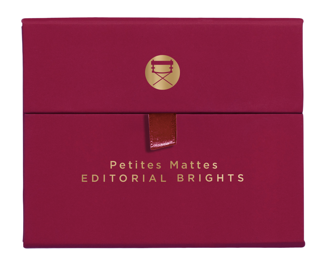 Closed palette with 12 bright matte pigments including red, blue, yellow, and green, perfect for creative, editorial makeup.
