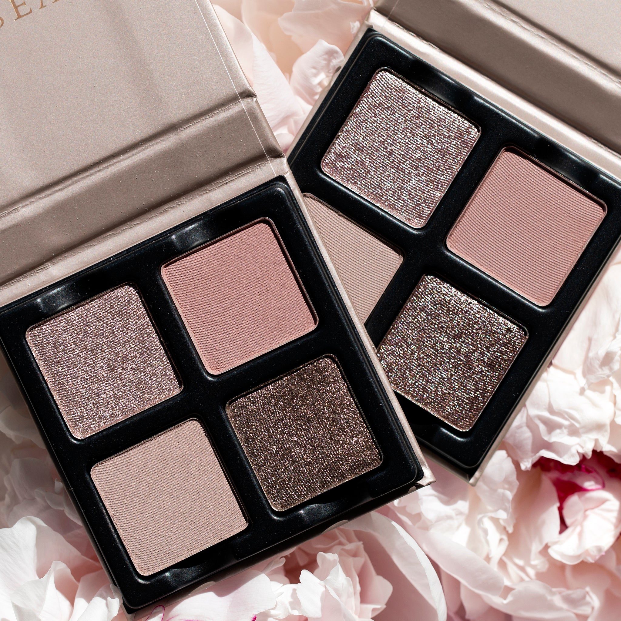 Open Petits Fours Lilas palette with soft lilac, mauve, and pink-toned eyeshadows in shimmer and matte finishes.