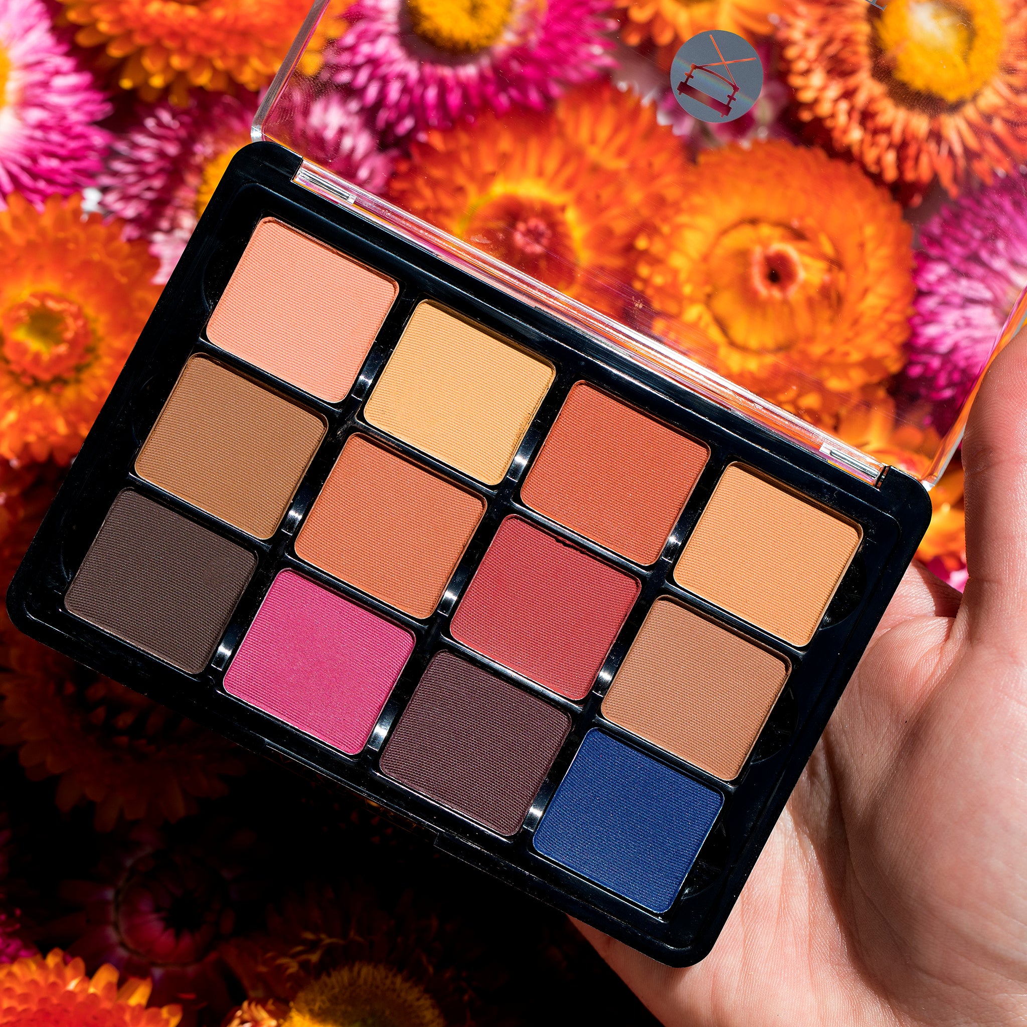 Open palette showing a full range of matte neutrals from bone to deep bark, ideal for contour, brow, and base across all skin tones.