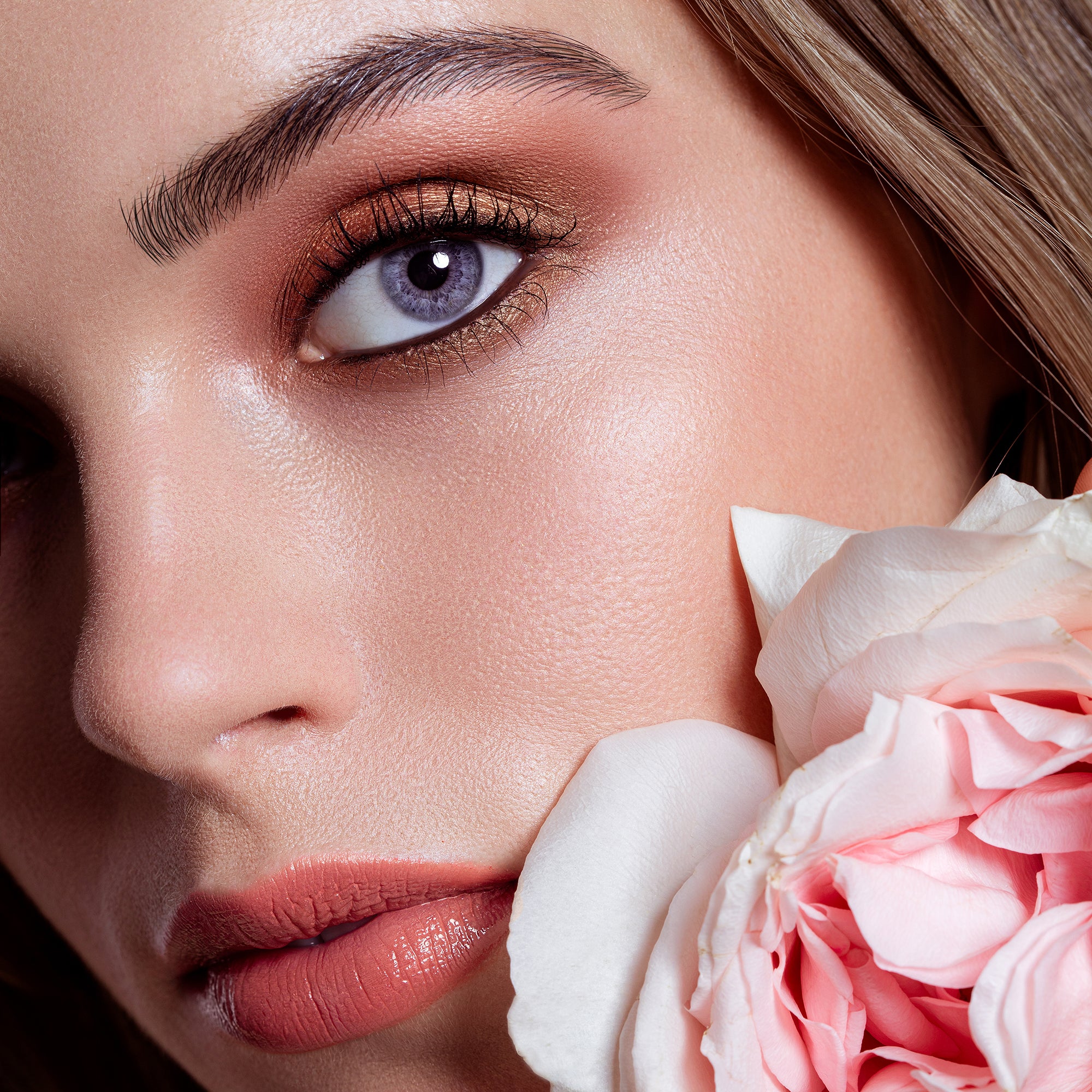 Swatches of eyeshadow powders from the Paris Edit palette on fair skin, showcasing versatile tones to highlight and emphasize the eyes.