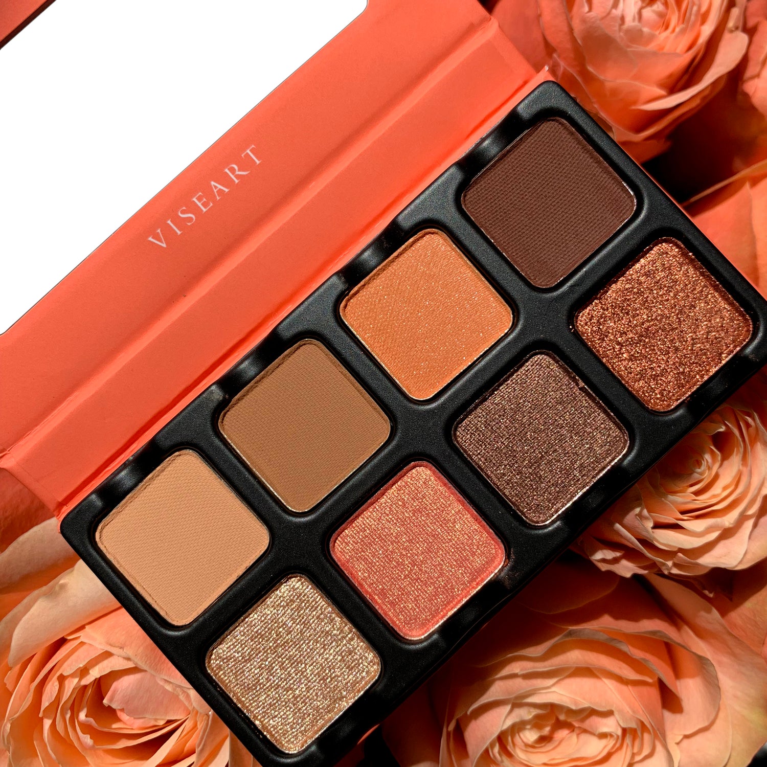 Open view of Petit Pro Apricotine showing warm peach, apricot, and golden brown matte and shimmer shades in a compact layout.