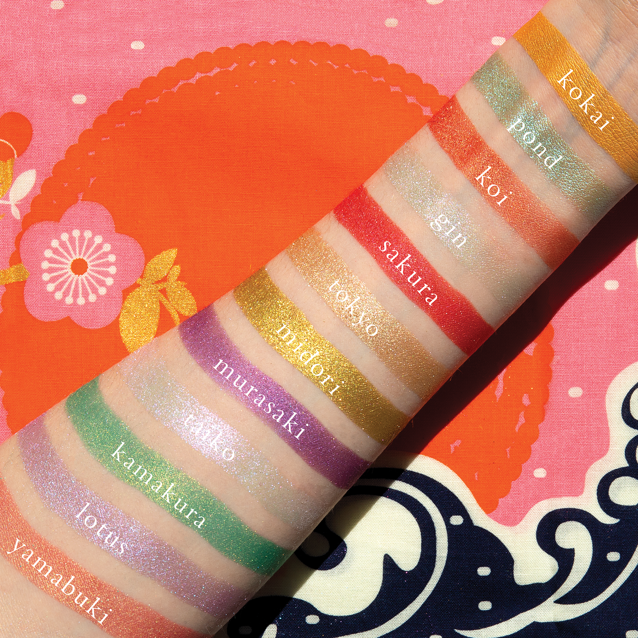 Swatches of lilac, rose gold, and icy lavender duochrome shimmer shades from Petites Shimmers Coy on fair skin tone.