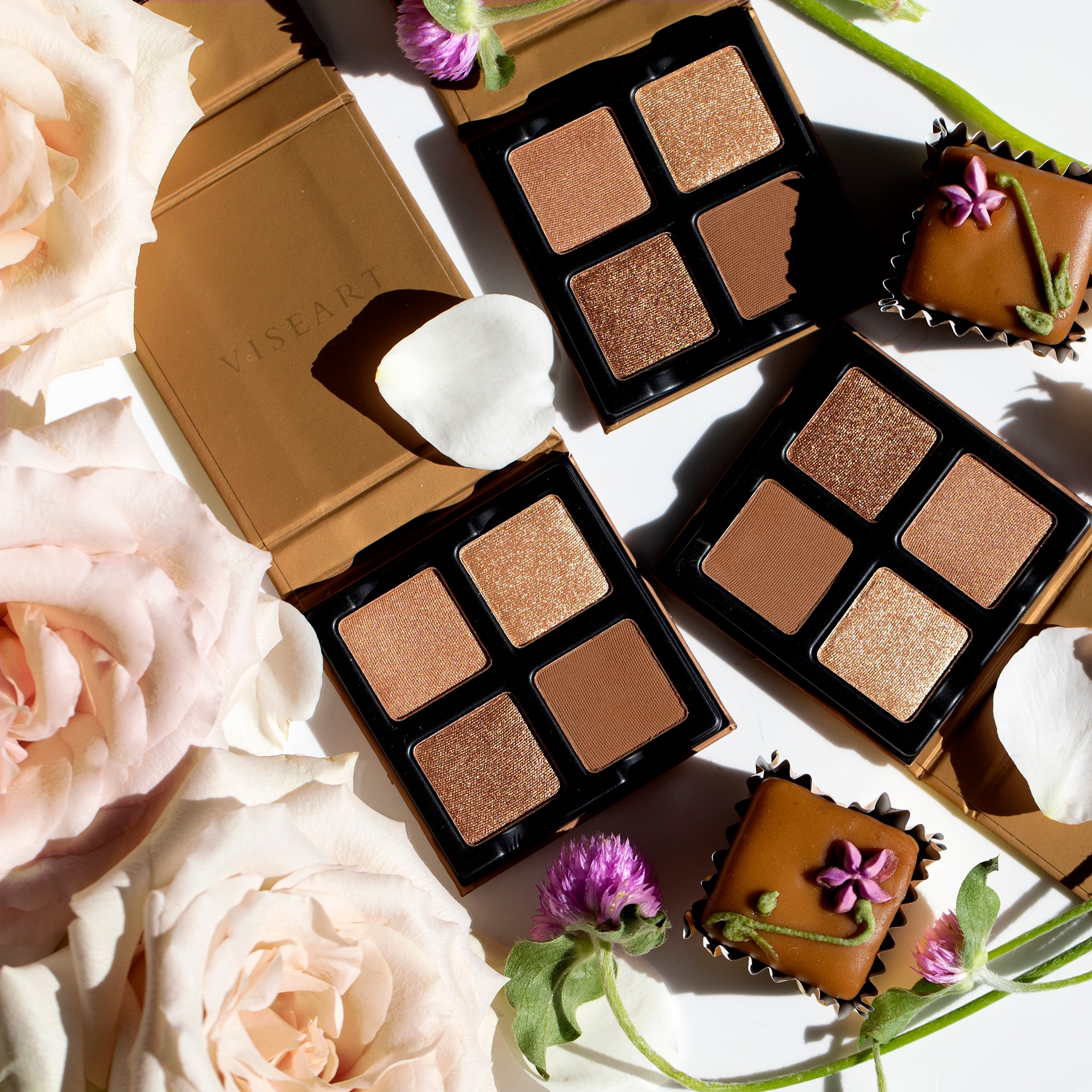 Petits Fours Praline featured with warm-toned Petits Fours palettes in a flat lay composition.