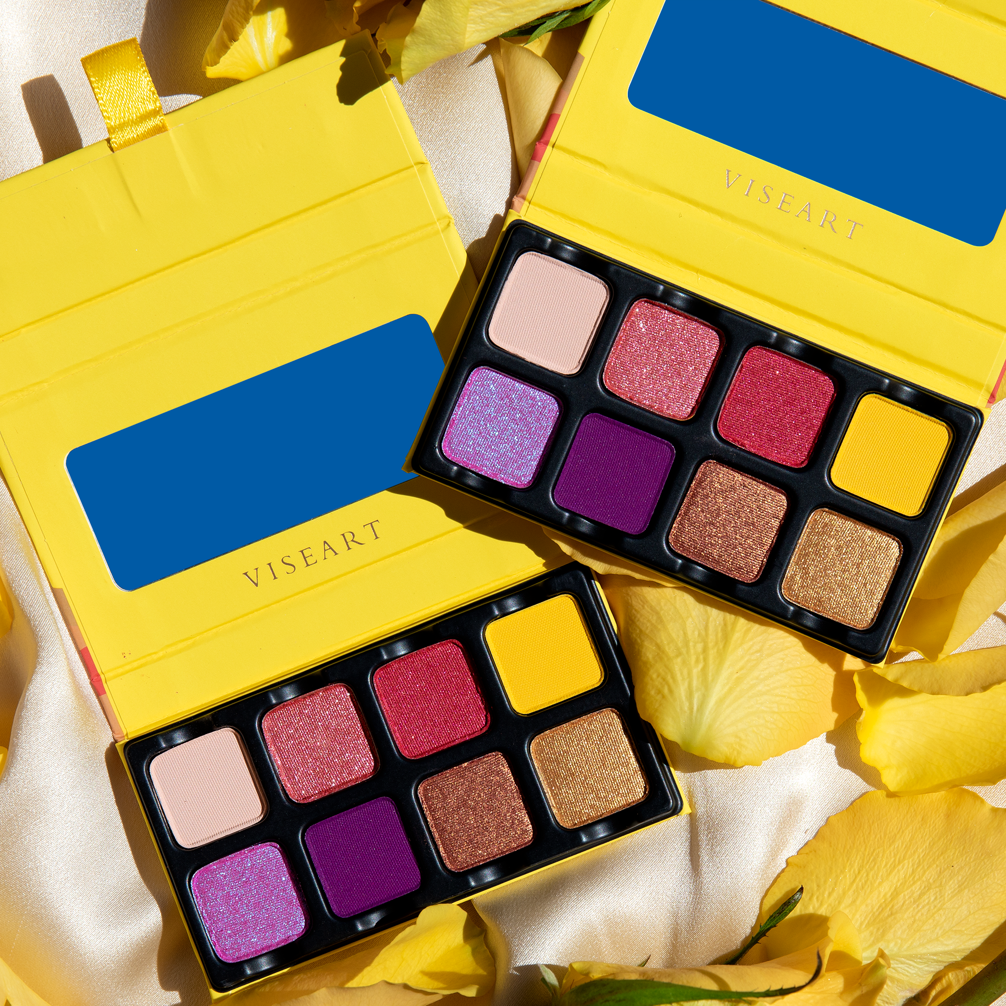 Open Petit Pro Soleil palette featuring bright citrus, coral, lavender, and golden shimmer tones.