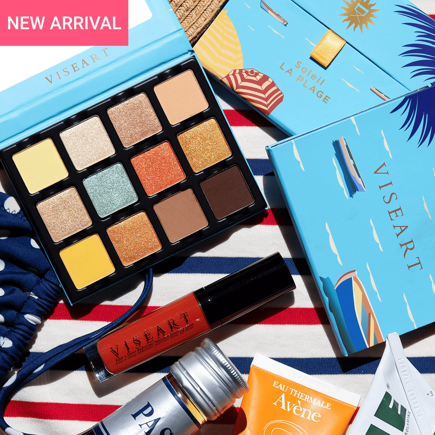 Open palette of vibrant beach tones including coral shimmer, sunbeam gold, and bronze foil for summer glam.