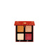Opened Petits Fours Garnet palette with garnet shimmer, plum satin, and wine-toned matte shadows.